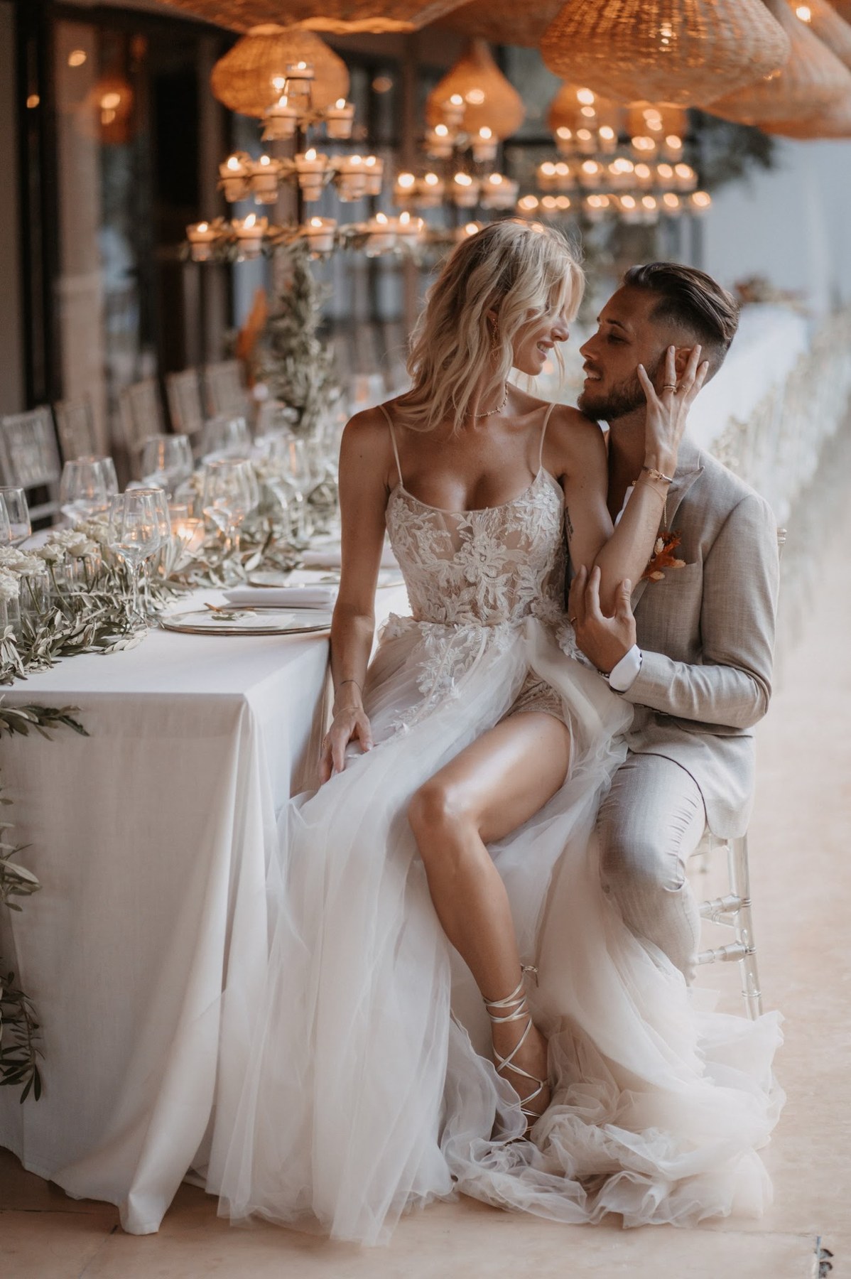 Wedding couple during a candlelit dinner